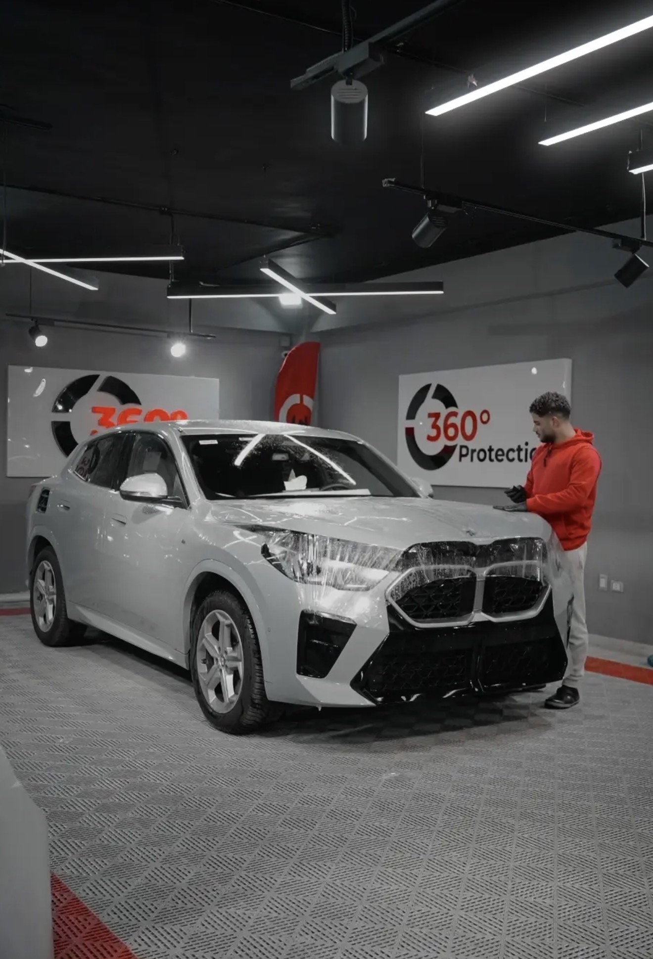 PPF wet application on a grey BMW X2